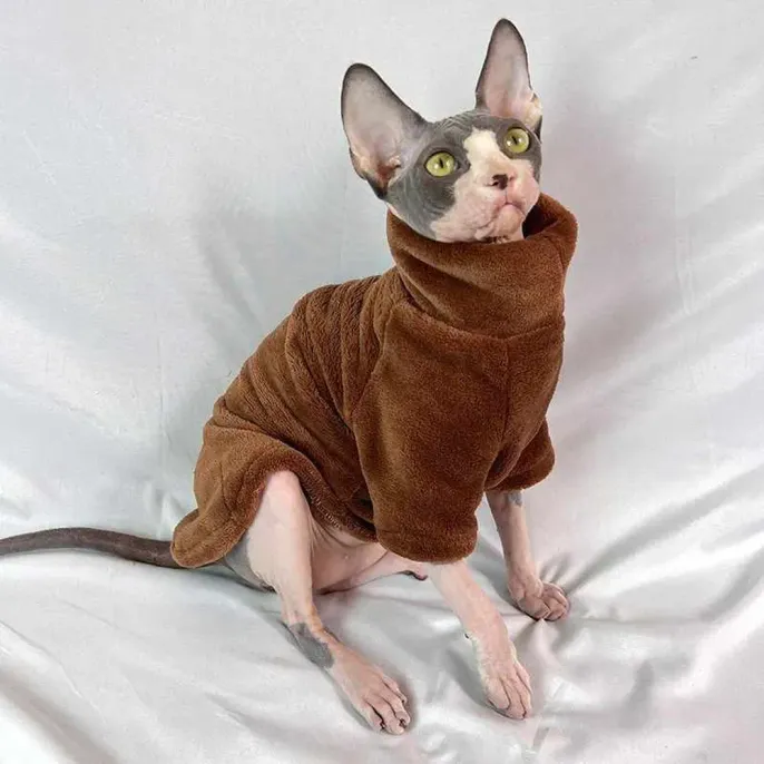 Tailored to fit hairless cat breeds like Sphynx, this clothing provides a secure and comfortable fit that ensures maximum warmth and protection. The stretchy fleece conforms to the body without restricting movement.
