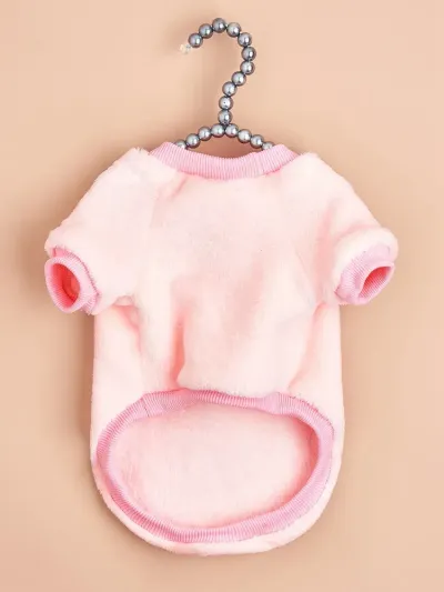 Fashionable and Cozy Winter Apparel: This stylish fleece sweatshirt not only keeps pets warm but also adds a fashionable touch with its leather label, making it the perfect winter apparel for pets.