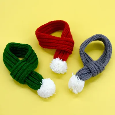 Scarf for Pet (5) Keep your pet cozy and stylish with this soft knitted Christmas scarf, featuring fluffy pom-poms and an easy-to-wear loop design for ultimate comfort.