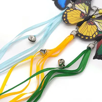 Designed for interactive play, this butterfly-shaped cat teaser head comes with a bell and vibrant tassels, perfect for engaging your cat’s natural instincts.