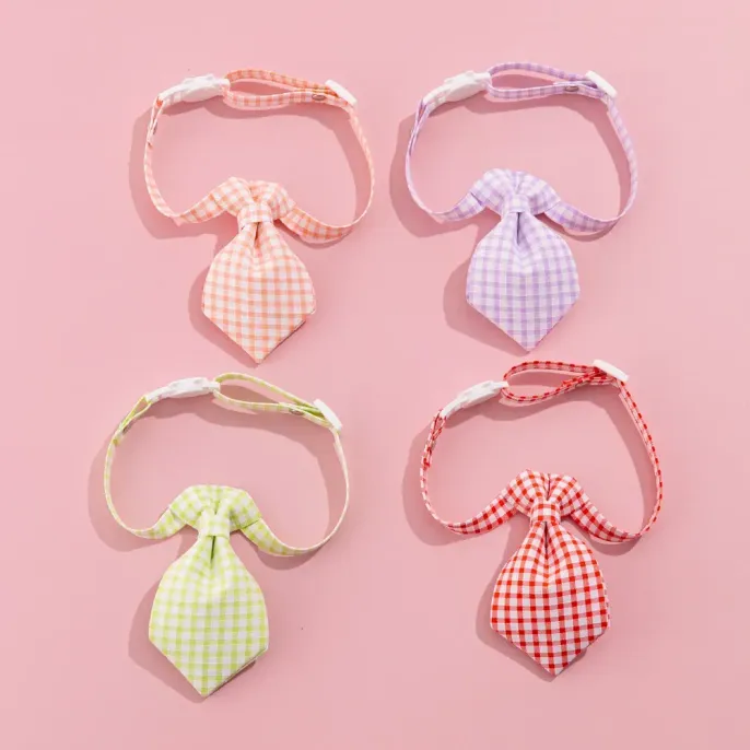 pet bow tie (1)_1 This versatile collar is suitable for both cats and small dogs, making it a must-have accessory for retailers catering to a variety of pets. The adjustable sizing ensures a perfect fit for pets of different breeds.