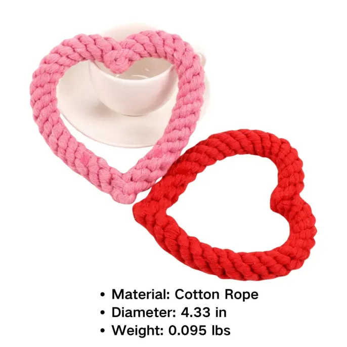 cotton rop dog toy (2) This durable heart-shaped cotton rope toy is ideal for tug-of-war and fetch, promoting healthy teeth and gums while ensuring fun for your pet.