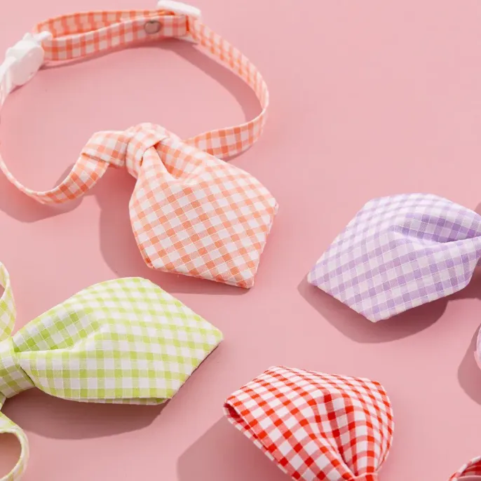pet bow tie (3)_1 Made from high-quality fabric, this bow tie collar is soft on pets' skin while being durable enough to withstand daily wear. It’s an excellent addition for pet stores looking for stylish and practical pet accessories.