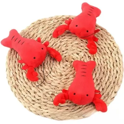 Dog chew toy (2) The plush sound lobster chew toy features an engaging built-in sound device, making it perfect for interactive play and ideal for pet retailers looking for toys that keep dogs entertained for hours.