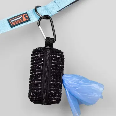 Pet Poop Bag Dispenser wholesale (5) Featuring a silicone bag outlet, this poop bag dispenser ensures smooth and easy access to waste bags, allowing pet owners to quickly grab a bag during walks.