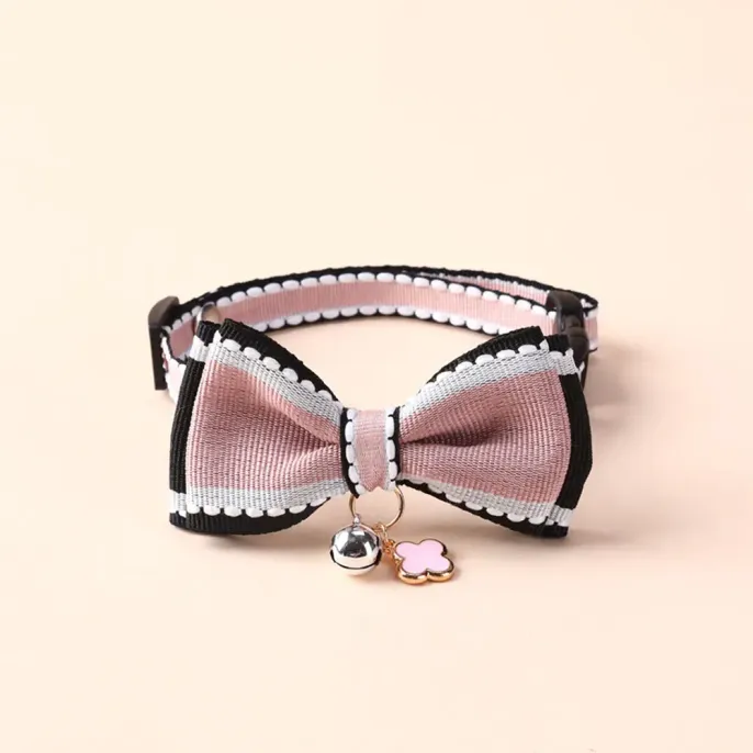 Bow Tie Pet Collar with Bell (6) A charming bell accent adds an extra element of fun and functionality, helping pet owners easily track their pets’ movements.