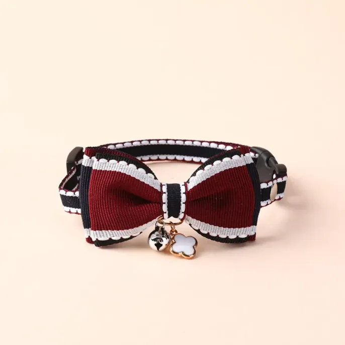Bow Tie Pet Collar with Bell (4) Charming Bell Accent: The collar includes a small, cute bell that adds to the pet's charm while providing a pleasant sound.