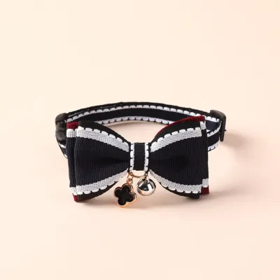 Bow Tie Pet Collar with Bell (5) Fashionable double-layer bow tie pet collar with adjustable length, durable alloy buckle, and charming bell – perfect for small dogs and cats.