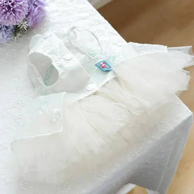 Puffy Tulle Pet Dress (4) The pearl necklace accent adds a touch of luxury and sophistication, making this dress a standout choice for stylish pets attending special events.