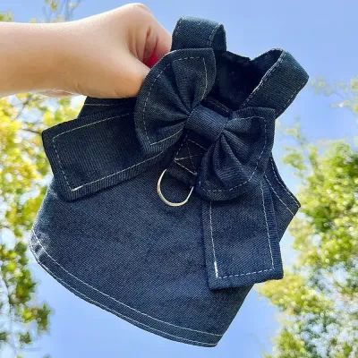 Pet Denim Dress with Butterfly Bow (7) Secure Fit: The adjustable straps and D-ring provide a secure fit and easy leash control, keeping your pet safe while walking.