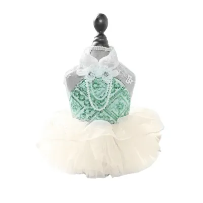 Puffy Tulle Pet Dress (2) This mint green tulle pet dress features a puffy skirt and a pearl necklace design, perfect for high-end events like weddings and parties.