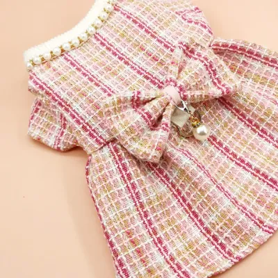 The bow headband and faux pearl necklace add a stylish touch to the coat, making this set perfect for pets that love to stand out and showcase their fashionable side.