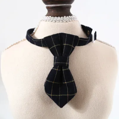 pet bow tie (5) A versatile, stylish British checkered bow tie and tie pet collar, adjustable for comfort and perfect for adding elegance to any pet’s outfit.