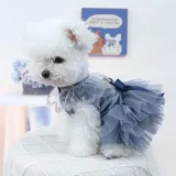 pet wedding dress (4) A high-end, elegant tulle pet dress with a puffy skirt, perfect for weddings or special occasions, featuring a leash D-ring for convenience.