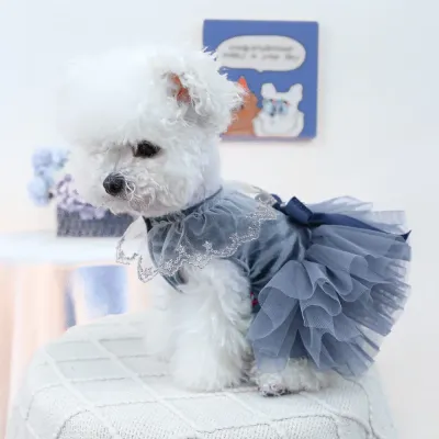 A high-end, elegant tulle pet dress with a puffy skirt, perfect for weddings or special occasions, featuring a leash D-ring for convenience.
