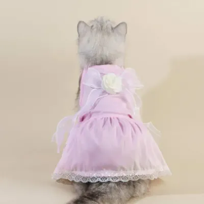 cat apparel for cats (8) Elevate any special occasion with this 2-piece tulle dress and bow hair clip set, designed to offer a complete, elegant outfit for pets.