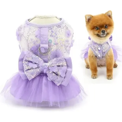 pet clothing for dogs (3) The dress is adorned with a delicate bow, enhancing its sophisticated look. Whether for a photoshoot, party, or a casual day out, the bow adds a cute and charming touch.