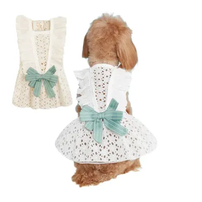 pet clothes dog apparel (8) Featuring a delicate bow knot and a flowing skirt, this dress brings a regal and elegant look to any pet’s wardrobe.