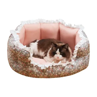 Floral pet bed with elegant lace trim for added charm (1) Four-sided enclosure design offers cozy, secure comfort