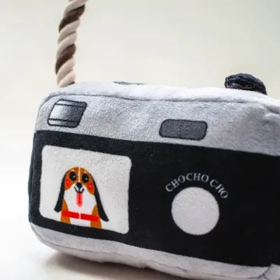 Soft Camera-Shaped Dog Toy with Squeaker and Rope Details Soft Camera-Shaped Dog Toy with Squeaker and Rope
