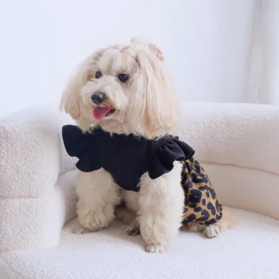 "A unique blend of rock-inspired, gothic design and playful leopard print, perfect for fashion-forward pet owners."