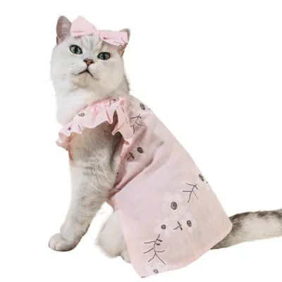 "Stylish floral pet clothes and matching hair clip set for small and medium pets."