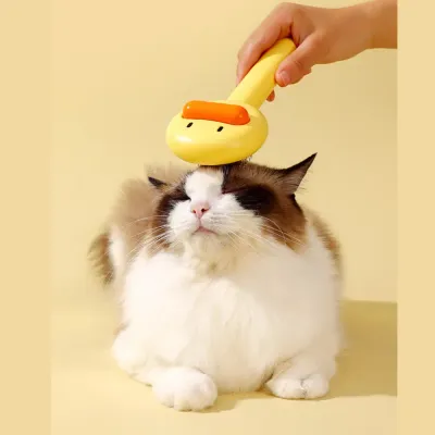 "Cute duck-shaped grooming brush – ideal for long and short coats, suitable for both cats and dogs."