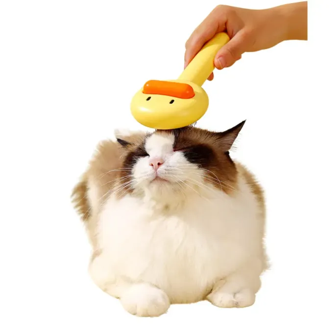 cat grooming comb (7) "Durable and ergonomic pet grooming brush with a playful design – makes grooming fun for both pets and owners."