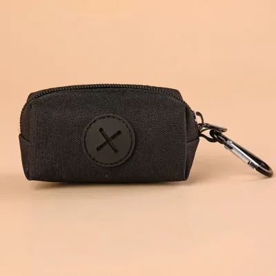 "Hands-free dog poop bag holder clips to any leash or bag for ultimate convenience."