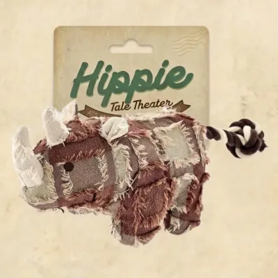 Hippie Tale Theater rhinoceros plush dog toy with vintage style cardboard packaging.