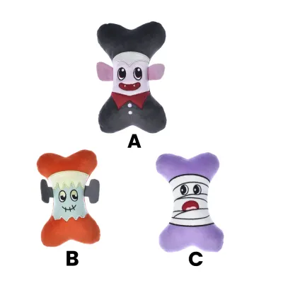 A collection of three bone-shaped Halloween plush dog toys featuring a Vampire, Frankenstein, and Mummy design.