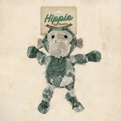 Green patchwork hippie series plush monkey dog toy with Petfairs retail header card.