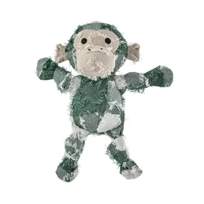Artisanal yarn-dyed fabric monkey dog toy isolated on a clean white background.