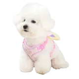 small white dog wearing pink adjustable dog harness with plush squeaky toy attached
