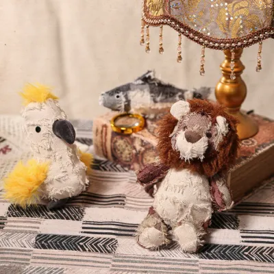 Hippie Series Plush Pet Toy Wholesale Collection Collection of petfairs hippie series toys including a lion parrot and fish on a vintage background.