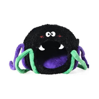 A round, black plush spider-shaped pet bed with purple and green legs and cartoon eyes.