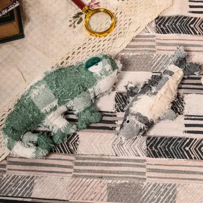 Hippie Series Pet Toys Collection Fish cat toy and chameleon pet toy displayed together on a patterned rug.