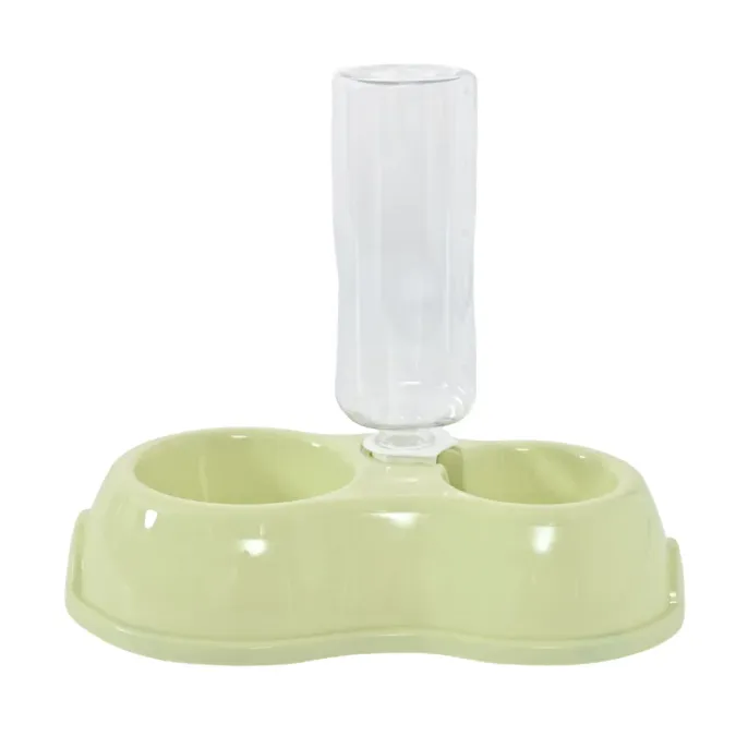 light-green-2-in-1-pet-feeder A light green 2-in-1 pet feeding station featuring a dry food bowl and an automatic water dispenser.