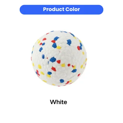 Close-up of a white E-TPU dog ball featuring a colorful speckled pattern and a bumpy surface for grip.