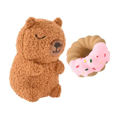 wholesale-squeaky-dog-toy-set-bear-and-donut Isolated view of a brown textured plush bear and a pink latex donut squeaky toy for wholesale pet supply inventory.