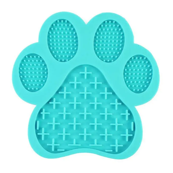 A light blue or turquoise paw-shaped silicone mat designed to slow down eating and reduce anxiety in pets.