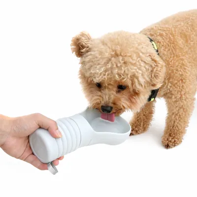 Portable Foldable Dog Water Bottle Drinking from Cup | Petfairs Wholesale small dog drinking water from portable foldable silicone dog water bottle handheld pet travel cup