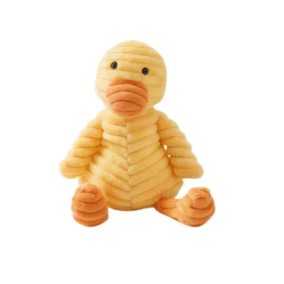Yellow Duck Plush Squeaky Dog Toy Durable Chew Toy Wholesale Petfairs Yellow duck shaped plush squeaky dog chew toy isolated on white background