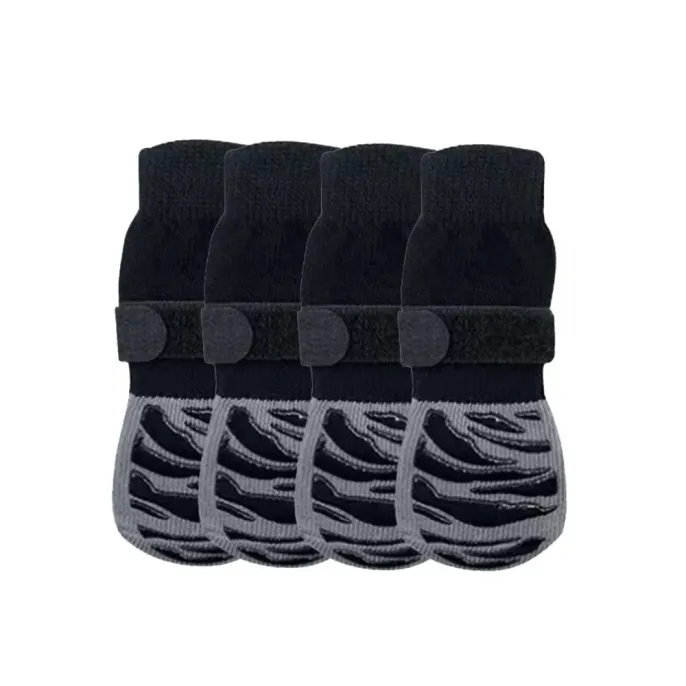 striped-print-breathable-dog-socks-4-pack A 4-pack of black and grey striped dog socks with thick rubberized tread and secure adjustable velcro fasteners.