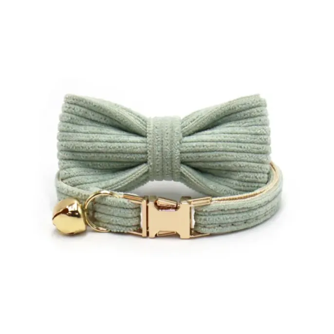 mint-green-corduroy-cat-collar-moq-wholesale Mint green corduroy cat collar with a ribbed texture bow tie and a gold bell accessory.