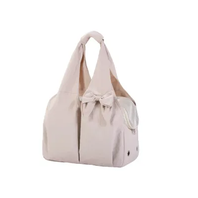 Side view of a premium beige pet carrier tote with ventilation holes and a secure zipper opening on a white background.