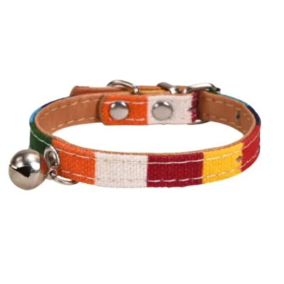 Side view of a colorful striped pet collar with silver hardware and bell on a white background.
