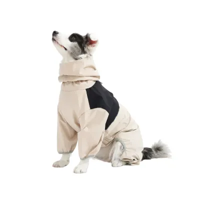 Beige Full-Protection Dog Raincoat Profile View Side view of a dog wearing a beige waterproof jumpsuit with a high neck and adjustable drawstring.