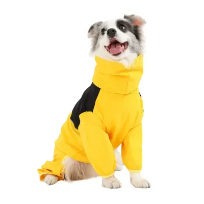 Yellow Full-Body Dog Waterproof Raincoat A medium-sized dog wearing a bright yellow waterproof full-body raincoat with a high adjustable neck and black shoulder accents.