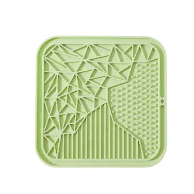 Top view of a green square silicone dog lick mat featuring nubs, ridges, and geometric patterns for different food types.